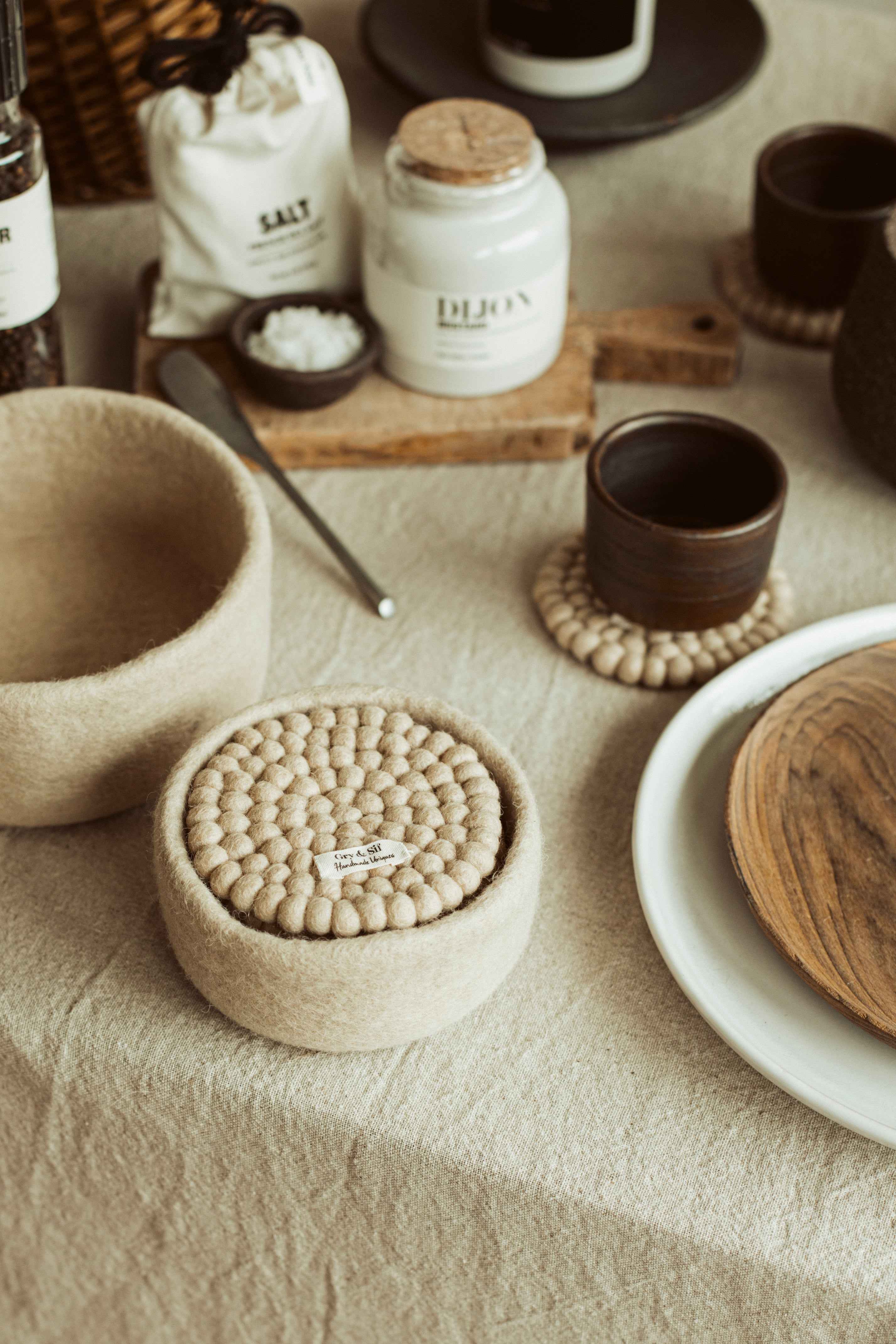 vilten onderzetters in mandje - set van 4