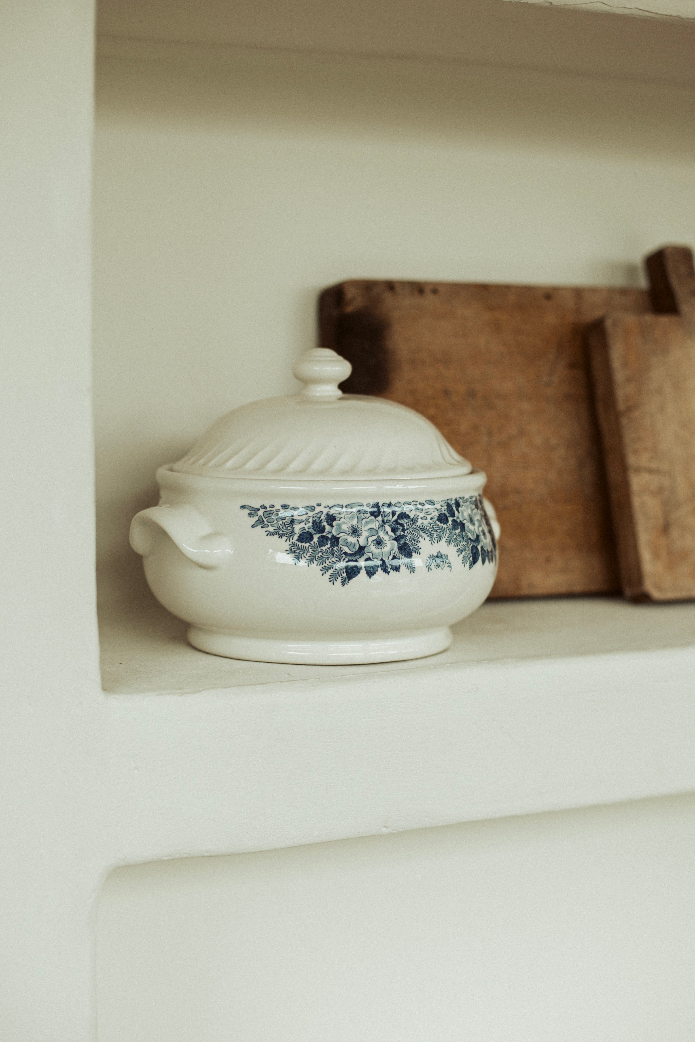 white terrine with blue flowers and lid